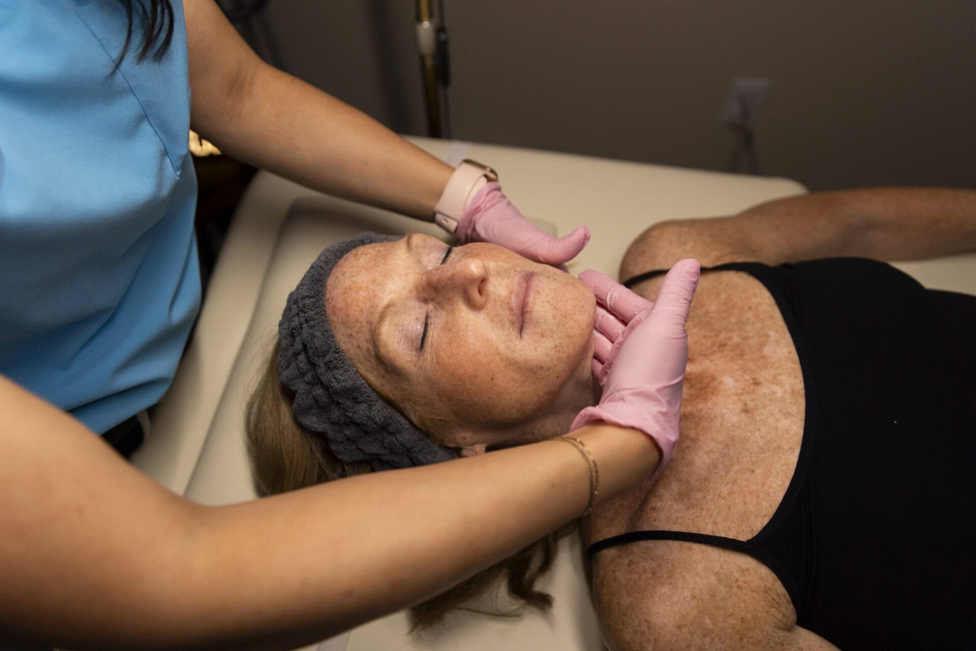 Healthy women receiving IV vitamin infusion at wellness clinic in Massachusetts, holistic health, wellness, IV therapy, vitamin drip, health and relaxation.