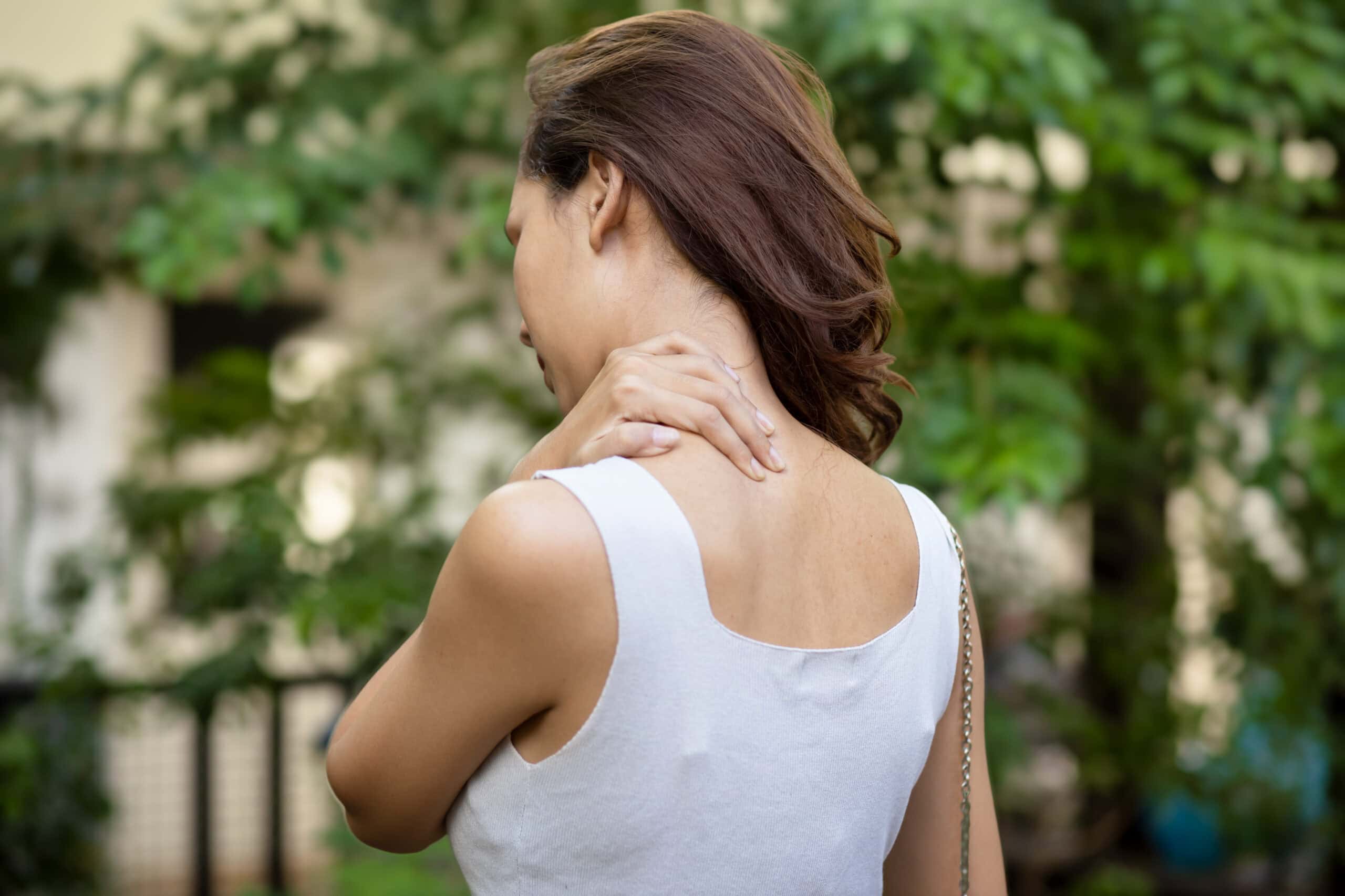 Neck pain relief woman outdoors natural healing wellness therapy, healthy lifestyle concept.