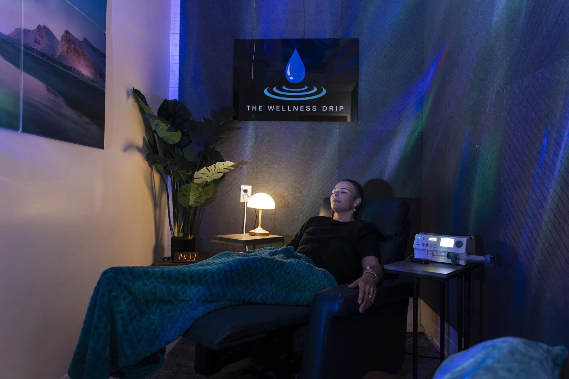 Relaxing wellness clinic with patient receiving ketamine therapy, infused vitamin treatments, NAD+, ozone therapy, and other holistic services in a calming environment.