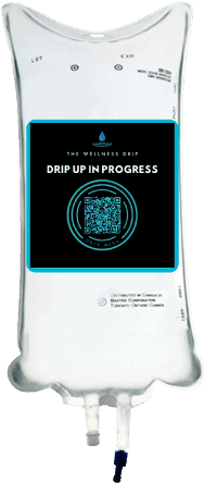 A medical IV drip bag from The Wellness Drip Holyoke, used for hydration and vitamin therapy, featuring a digital display and QR code for patient care.